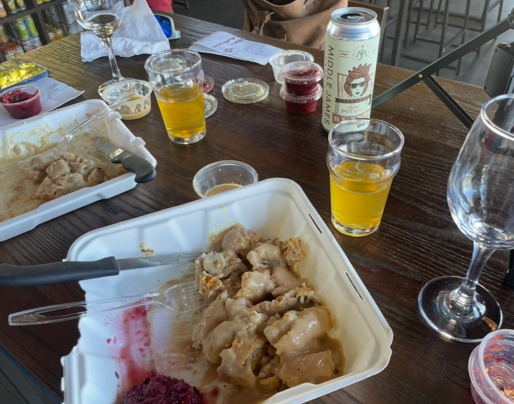 Flaming Amy's churkeychanga 2024, cut up and being enjoyed with beer and wine at Fermental