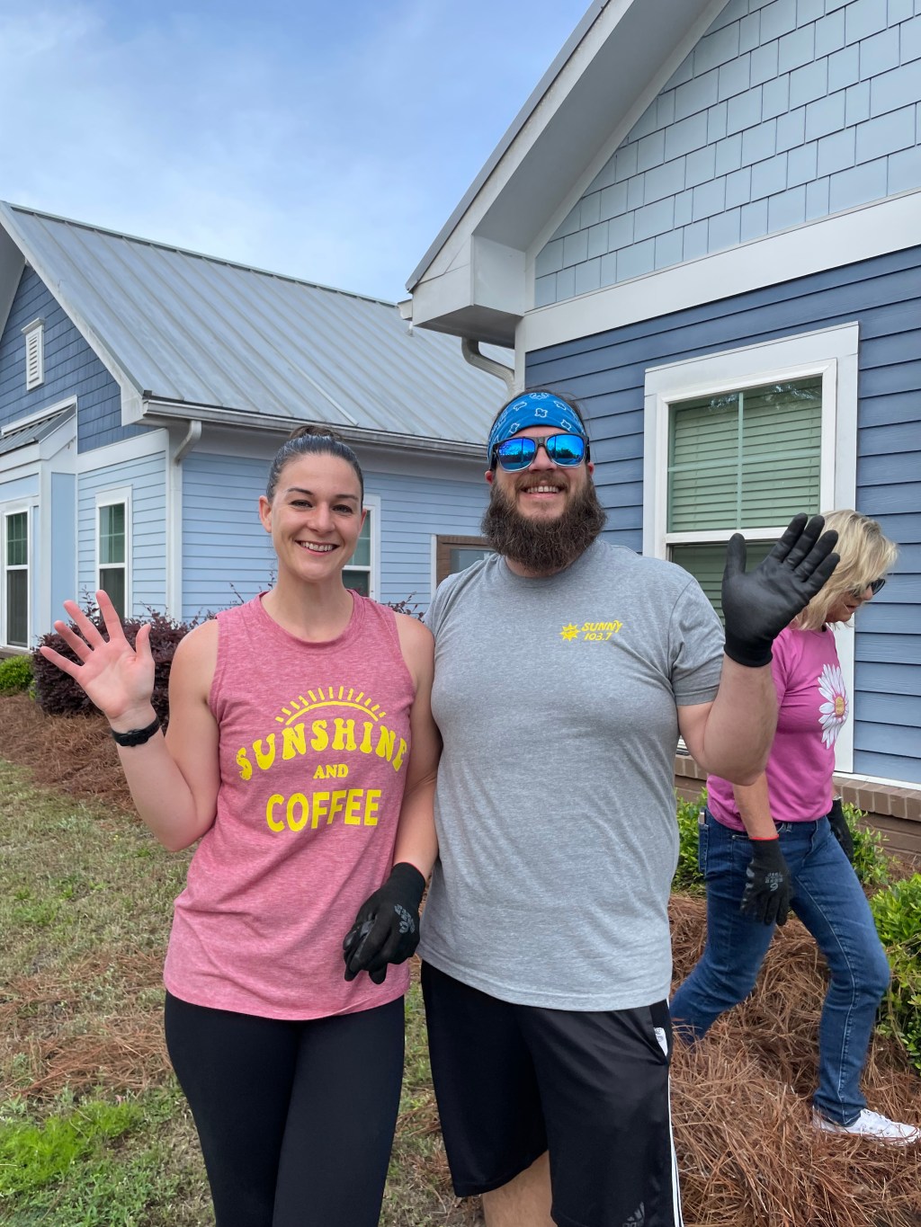 Luke and Naomi Volunteering to Lay Pine Straw at a Community Housing Location