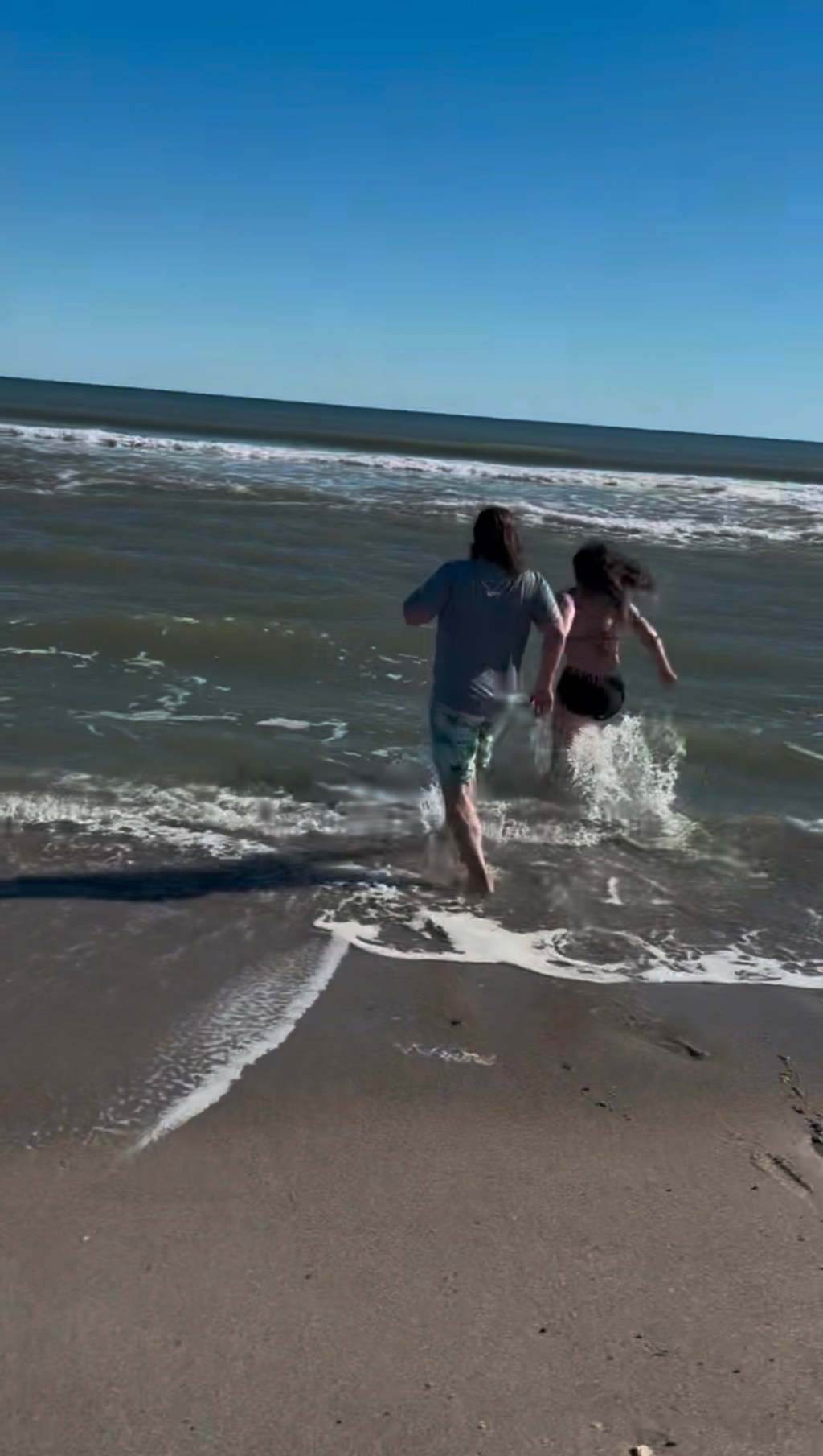 Luke and Naomi Running into the Ocean on New Year's Day